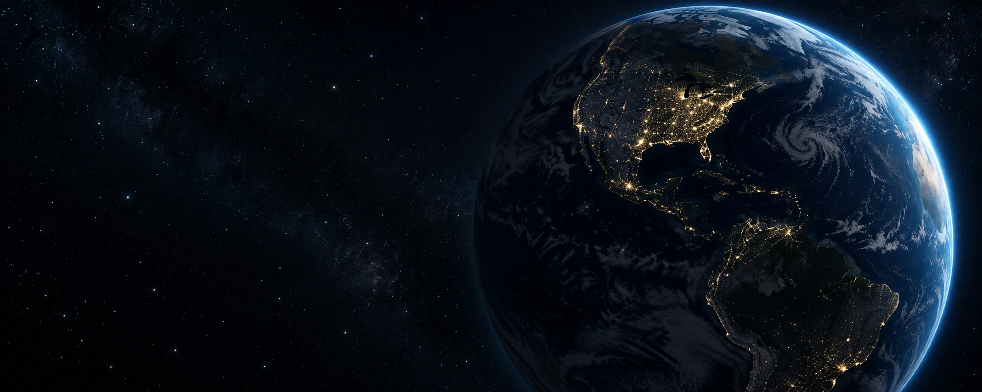 Earth at night above a starfield